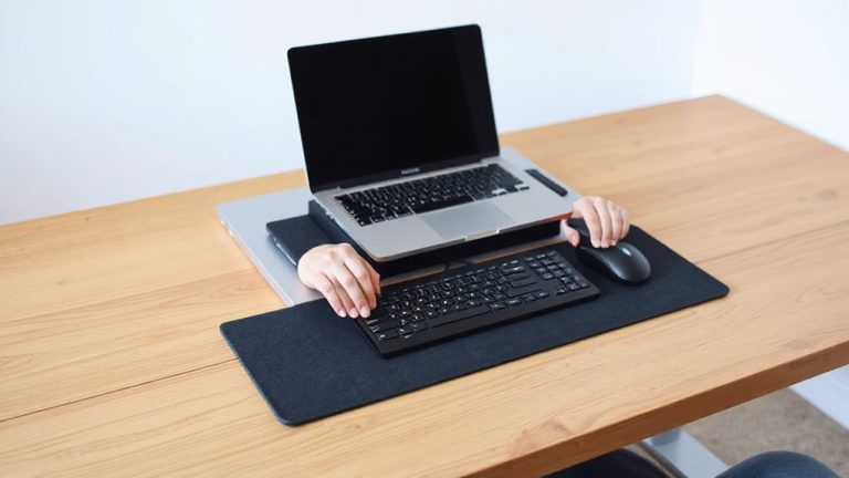 ergonomic laptop dock placement