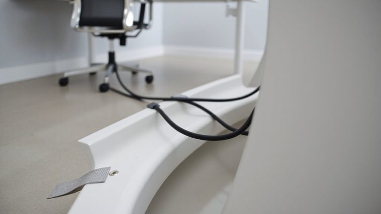 wall to desk cable raceway installation